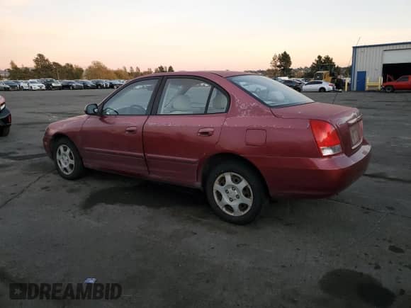 2003 Hyundai Elantra GLS z VIN KMHDN45D53U586516, wystawiony jako Copart lot #80085154 z przebiegiem 199 522 mil mil oraz Szkoda całkowita • Salvage title. Historia ofert i sprzedaży dostępna na DreamBid. Obrazek 2.