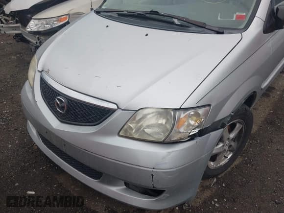 ✅ 2003 Mazda MPV LX • VIN: JM3LW28J430340901 • Lot: 42576024. Listed on IAAI with Not provided. Free auction sales archive from the USA and detailed vehicle history report at DreamBid. Image 6.