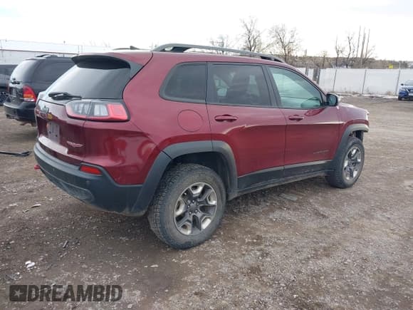 ✅ 2019 Jeep Cherokee Trailhawk Elite • VIN: 1C4PJMBX3KD483704 • Lot: 40994848. Listed on IAAI with 176,770 mi. Free auction sales archive from the USA and detailed vehicle history report at DreamBid. Image 4.