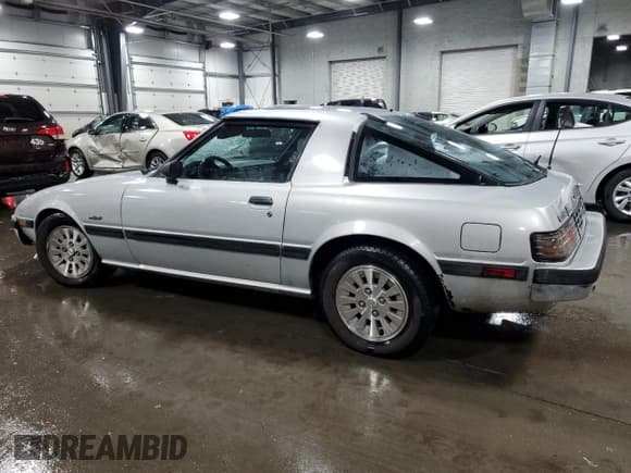 ✅ 1985 Mazda RX-7 • VIN: JM1FB3327F0881937 • Lot: 74971764. Wystawiony na Copart z przebiegiem 271 129 mil. Bezpłatny archiwum sprzedaży aukcyjnych z USA i szczegółowy raport historii pojazdu na DreamBid. Zdjęcie 2.