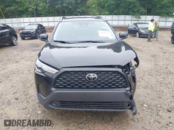 ✅ 2023 Toyota Corolla Cross LE • VIN: 7MUCAAAG0PV053404 • Лот: 42318679. Опубликован ранее на IAAI с пробегом 34 969 миль. Бесплатный доступ к архиву аукционных продаж из США и подробный отчёт об истории автомобиля на DreamBid. Изображение 13.