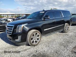 ✅ 2020 Cadillac Escalade ESV Luxury • VIN: 1GYS3HKJ8LR221392 • Lot: 56656015. Listed on Copart with 205,799 mi. Free auction sales archive from the USA and detailed vehicle history report at DreamBid. Image 1.