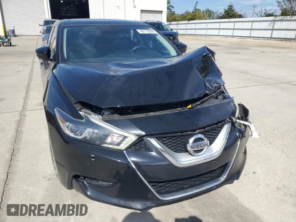 ✅ 2017 Nissan Maxima Platinum • VIN: 1N4AA6AP4HC444174 • Lot: 82112205. Listed on Copart with 100,785 mi. Free auction sales archive from the USA and detailed vehicle history report at DreamBid. Image 5.