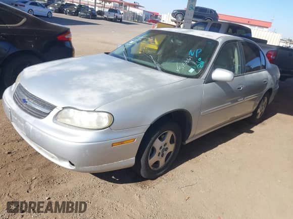 2003 Chevrolet Malibu LS z VIN 1G1NE52J63M515861, wystawiony jako IAAI lot #41552694 z przebiegiem 180 086 mil mil oraz . Historia ofert i sprzedaży dostępna na DreamBid. Obrazek 2.