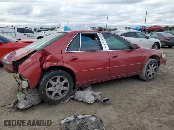 ✅ 2002 Cadillac Seville Touring STS • VIN: 1G6KY54902U132357 • Lot: 42008795. Listed on Copart with 111,014 mi. Free auction sales archive from the USA and detailed vehicle history report at DreamBid. Image 3.