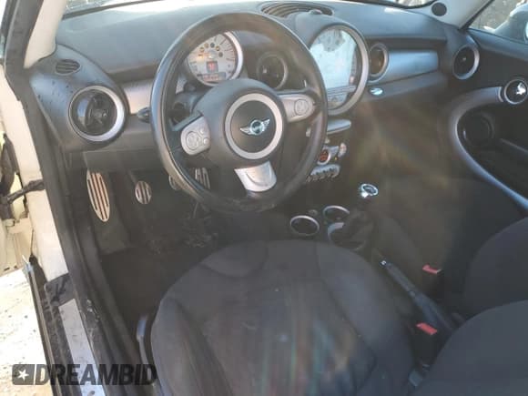 ✅ 2009 MINI Hardtop S • VIN: WMWMF73539TX40005 • Лот: 92608455. Опубликован ранее на Copart с пробегом 112 459 миль. Бесплатный доступ к архиву аукционных продаж из США и подробный отчёт об истории автомобиля на DreamBid. Изображение 8.