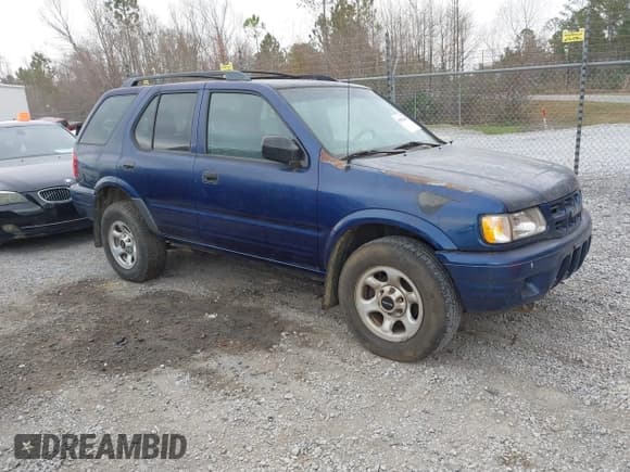 ✅ 2002 Isuzu Rodeo S • VIN: 4S2CK58W824315044 • Lot: 41532841. Listed on IAAI with 285,951 mi. Free auction sales archive from the USA and detailed vehicle history report at DreamBid. Image 1.
