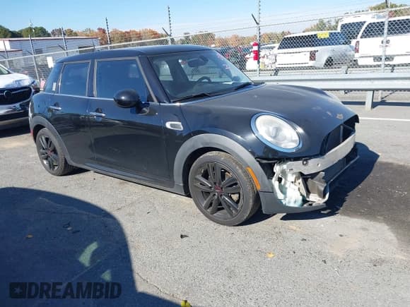 ✅ 2015 MINI Hardtop 4 Door • VIN: WMWXS5C59FT830719 • Lot: 43610367. Listed on IAAI with 90,169 mi. Free auction sales archive from the USA and detailed vehicle history report at DreamBid. Image 1.