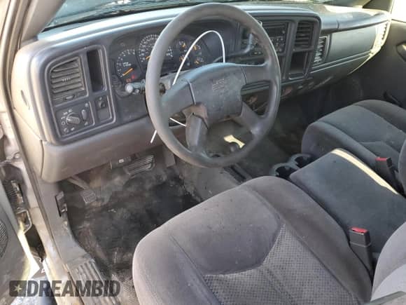 2006 Chevrolet Silverado 1500 LS z VIN 1GCEK19V06Z258785, wystawiony jako Copart lot #79352154 z przebiegiem 182 554 mil mil oraz Czysty tytuł • Clean title. Historia ofert i sprzedaży dostępna na DreamBid. Obrazek 8.