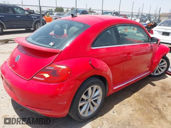 ✅ 2013 Volkswagen Beetle 2.0L TDI • VIN: 3VWJL7AT1DM634575 • Lot: 42554392. Listed on IAAI with 65,249 mi. Free auction sales archive from the USA and detailed vehicle history report at DreamBid. Image 4.