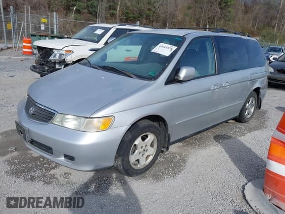 ✅ 2001 Honda Odyssey EX • VIN: 2HKRL18611H601564 • Lot: 43683828. Listed on IAAI with 184,613 mi. Free auction sales archive from the USA and detailed vehicle history report at DreamBid. Image 2.