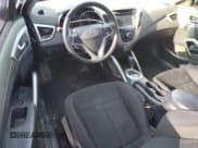 ✅ 2016 Hyundai Veloster • VIN: KMHTC6AD6GU279851 • Lot: 84328294. Listed on Copart with 148,201 mi. Free auction sales archive from the USA and detailed vehicle history report at DreamBid. Image 8.