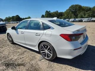 ✅ 2023 Honda Civic Touring • VIN: 2HGFE1F90PH319235 • Лот: 85580635. Опубликован ранее на Copart с пробегом 34 637 миль. Бесплатный доступ к архиву аукционных продаж из США и подробный отчёт об истории автомобиля на DreamBid. Изображение 2.