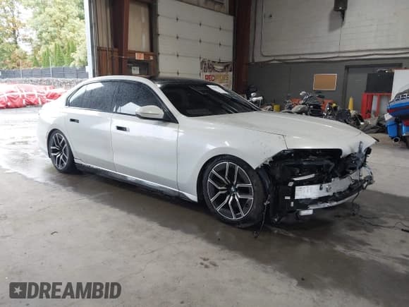 ✅ 2023 BMW 7 Series 760i xDrive • VIN: WBA33EJ01PCM24809 • Lot: 43310239. Listed on IAAI with 31,704 mi. Free auction sales archive from the USA and detailed vehicle history report at DreamBid. Image 1.