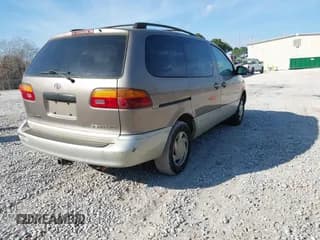 ✅ 1999 Toyota Sienna LE • VIN: 4T3ZF13C2XU153826 • Lot: 43725017. Listed on IAAI with 290,148 mi. Free auction sales archive from the USA and detailed vehicle history report at DreamBid. Image 4.