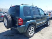 ✅ 2005 Jeep Liberty Limited • VIN: 1J4GK58K75W527169 • Lot: 42407079. Listed on IAAI with 103,011 mi. Free auction sales archive from the USA and detailed vehicle history report at DreamBid. Image 4.