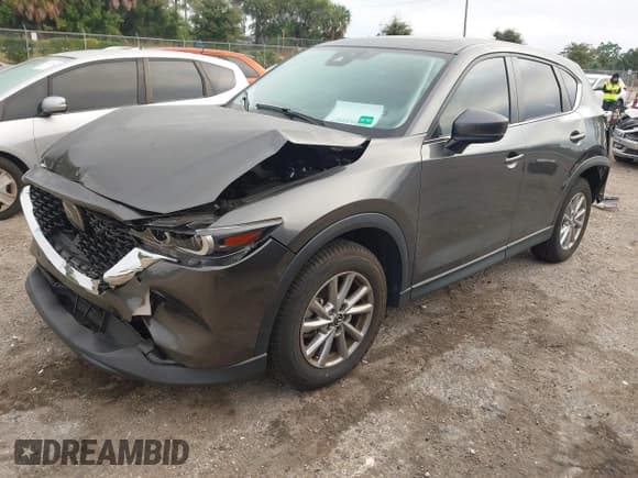 ✅ 2023 Mazda CX-5 S Preferred • VIN: JM3KFBCM3P0230215 • Lot: 43568007. Listed on IAAI with 42,607 mi. Free auction sales archive from the USA and detailed vehicle history report at DreamBid. Image 17.
