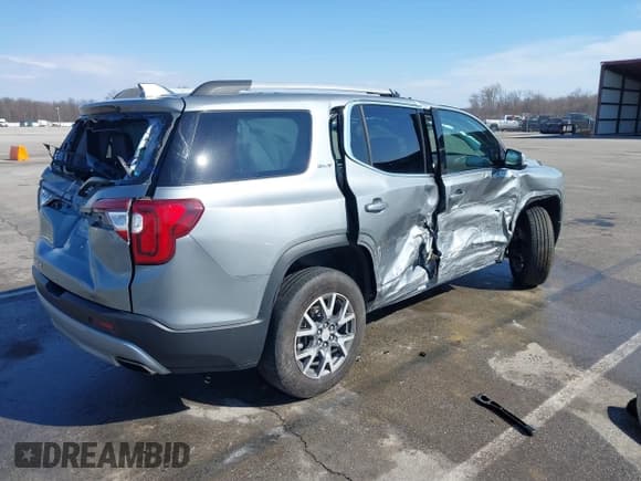 ✅ 2023 GMC Acadia SLT • VIN: 1GKKNML4XPZ175334 • Lot: 41669962. Listed on IAAI with 46,281 mi. Free auction sales archive from the USA and detailed vehicle history report at DreamBid. Image 4.