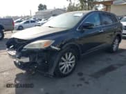 ✅ 2010 Mazda CX-9 Sport • VIN: JM3TB2MV0A0200295 • Лот: 41233604. Опубликован ранее на IAAI с пробегом 179 554 миль. Бесплатный доступ к архиву аукционных продаж из США и подробный отчёт об истории автомобиля на DreamBid. Изображение 2.