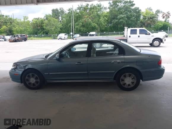 2004 Hyundai Sonata with VIN KMHWF25H64A045393, listed as a IAAI auction lot 42645956 with 114,112 mi miles and . Bid and sale history available at DreamBid. Image 14.