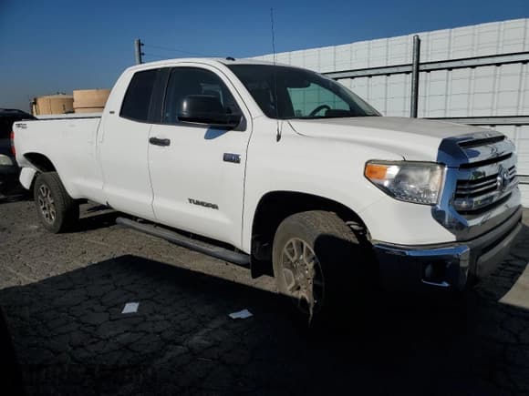 ✅ 2017 Toyota Tundra SR • VIN: 5TFTY5F16HX009503 • Lot: 84199964. Listed on Copart with 119,255 mi. Free auction sales archive from the USA and detailed vehicle history report at DreamBid. Image 4.