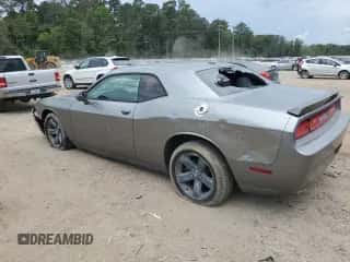 2012 Dodge Challenger R/T z VIN 2C3CDYBT1CH201725, wystawiony jako Copart lot #69679104 z przebiegiem 174 416 mil mil oraz Szkoda całkowita • Salvage title. Historia ofert i sprzedaży dostępna na DreamBid. Obrazek 2.