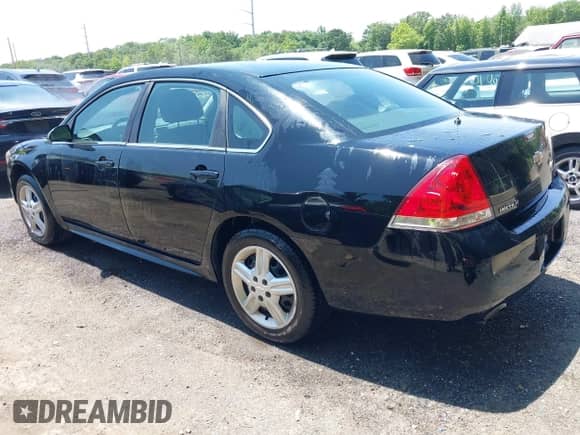 2013 Chevrolet Impala Police with VIN 2G1WD5E33D1248485, listed as a IAAI auction lot 42393973 with 101,900 mi miles and . Bid and sale history available at DreamBid. Image 3.