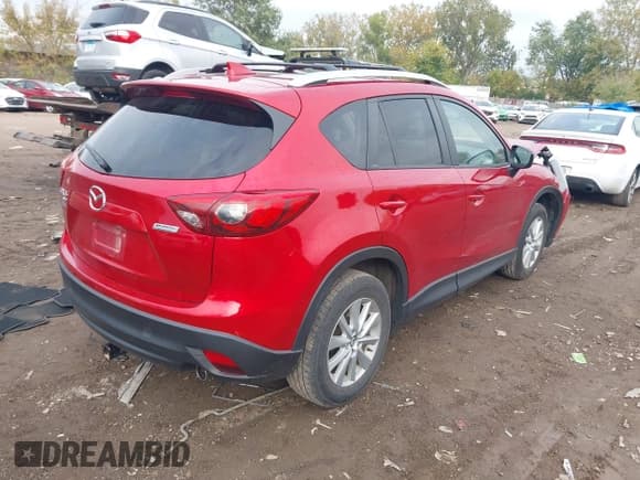 ✅ 2016 Mazda CX-5 Touring • VIN: JM3KE4CY9G0663412 • Лот: 43458762. Опубликован ранее на IAAI с пробегом 101 452 миль. Бесплатный доступ к архиву аукционных продаж из США и подробный отчёт об истории автомобиля на DreamBid. Изображение 4.