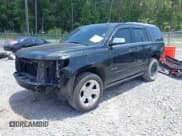 ✅ 2015 Chevrolet Tahoe LTZ • VIN: 1GNSCCKC8FR121461 • Lot: 42407901. Listed on IAAI with 137,729 mi. Free auction sales archive from the USA and detailed vehicle history report at DreamBid. Image 2.