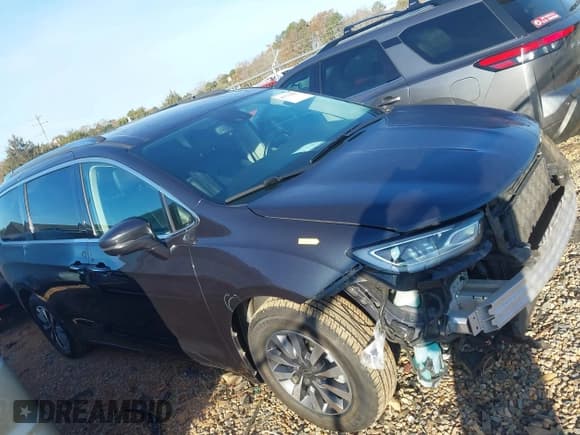 ✅ 2021 Chrysler Pacifica Hybrid Touring L • VIN: 2C4RC1L72MR594048 • Lot: 43772581. Listed on IAAI with 115,553 mi. Free auction sales archive from the USA and detailed vehicle history report at DreamBid. Image 13.