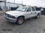 ✅ 2002 Dodge Dakota SLT • VIN: 1B7HL48N92S522859 • Lot: 43391019. Listed on IAAI with 242,154 mi. Free auction sales archive from the USA and detailed vehicle history report at DreamBid. Image 2.