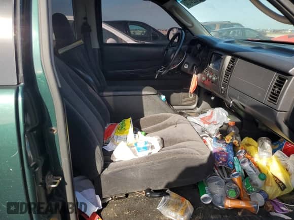 2002 Dodge Dakota z VIN 1B7GG12X52S705975, wystawiony jako Copart lot #75224734 z przebiegiem 150 441 mil mil oraz Szkoda całkowita • Salvage title. Historia ofert i sprzedaży dostępna na DreamBid. Obrazek 10.