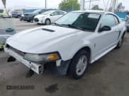 ✅ 2001 Ford Mustang Standard • VIN: 1FAFP40411F111810 • Lot: 42191705. Listed on IAAI with 180,413 mi. Free auction sales archive from the USA and detailed vehicle history report at DreamBid. Image 2.