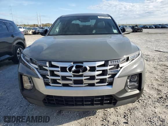 2022 Hyundai Santa Cruz SEL с VIN 5NTJBDAE6NH027649, выставлен на аукционе Copart как лот 84750644 с пробегом 12 264 миль миль и Списание • Salvage title. История ставок и продаж доступна на DreamBid. Изображение 5.