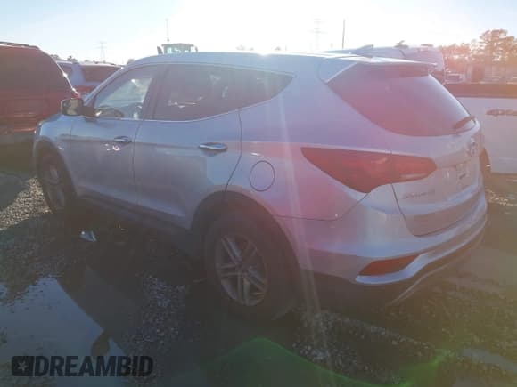 ✅ 2017 Hyundai Santa Fe 2.4L • VIN: 5XYZTDLB4HG391663 • Lot: 43924601. Listed on IAAI with 118,778 mi. Free auction sales archive from the USA and detailed vehicle history report at DreamBid. Image 3.