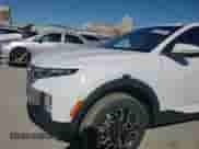 2022 Hyundai Santa Cruz SEL z VIN 5NTJBDAE3NH031402, wystawiony jako Copart lot #81236024 z przebiegiem 48 156 mil mil oraz Szkoda całkowita • Salvage title. Historia ofert i sprzedaży dostępna na DreamBid. Obrazek 11.