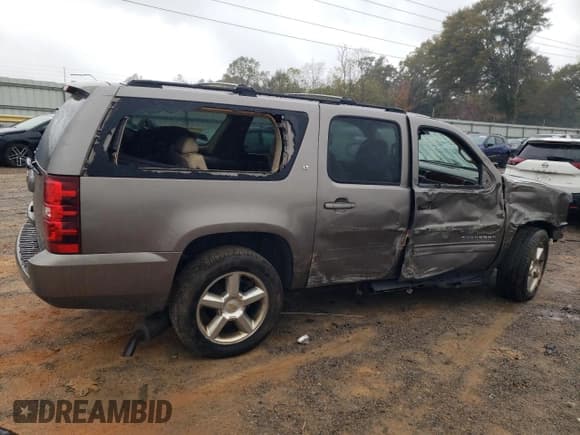 ✅ 2012 Chevrolet Suburban LT • VIN: 1GNSKJE72CR154344 • Lot: 90231455. Listed on Copart with 387,725 mi. Free auction sales archive from the USA and detailed vehicle history report at DreamBid. Image 3.