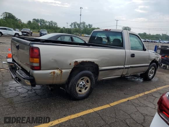 2002 GMC Sierra 1500 with VIN 1GTEC14W22Z113612, listed as a Copart auction lot 64998175 with 231,039 mi miles and Clean title. Bid and sale history available at DreamBid. Image 3.