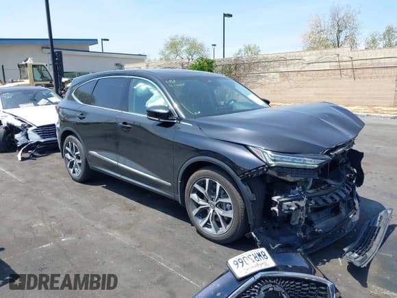 ✅ 2022 Acura MDX Technology • VIN: 5J8YD9H42NL002584 • Lot: 42052582. Listed on IAAI with 37,122 mi. Free auction sales archive from the USA and detailed vehicle history report at DreamBid. Image 1.