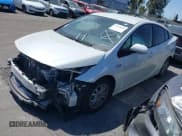 ✅ 2021 Toyota Prius LE • VIN: JTDKAMFP7M3183029 • Лот: 42422014. Опубликован ранее на IAAI с пробегом 58 121 миль. Бесплатный доступ к архиву аукционных продаж из США и подробный отчёт об истории автомобиля на DreamBid. Изображение 2.