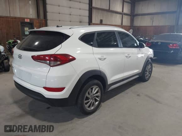 2017 Hyundai Tucson SE z VIN KM8J33A48HU404856, wystawiony jako IAAI lot #43225561 z przebiegiem 53 542 mil mil oraz . Historia ofert i sprzedaży dostępna na DreamBid. Obrazek 4.