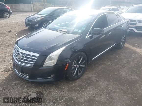 ✅ 2013 Cadillac XTS Livery • VIN: 2G61W5S30D9205565 • Lot: 43680796. Listed on IAAI with 263,933 mi. Free auction sales archive from the USA and detailed vehicle history report at DreamBid. Image 2.