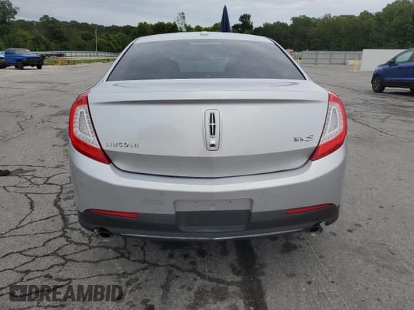 ✅ 2014 Lincoln MKS • VIN: 1LNHL9DK4EG611203 • Лот: 70106985. Опубликован ранее на Copart с пробегом 130 792 миль. Бесплатный доступ к архиву аукционных продаж из США и подробный отчёт об истории автомобиля на DreamBid. Изображение 6.