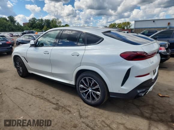 ✅ 2023 BMW X6 xDrive40i • VIN: 5UXCY6C07P9S07901 • Lot: 70306155. Listed on Copart with 29,049 mi. Free auction sales archive from the USA and detailed vehicle history report at DreamBid. Image 2.