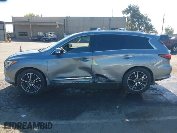 ✅ 2016 Infiniti QX60 • VIN: 5N1AL0MN2GC514857 • Lot: 43582806. Listed on IAAI with 106,150 mi. Free auction sales archive from the USA and detailed vehicle history report at DreamBid. Image 14.
