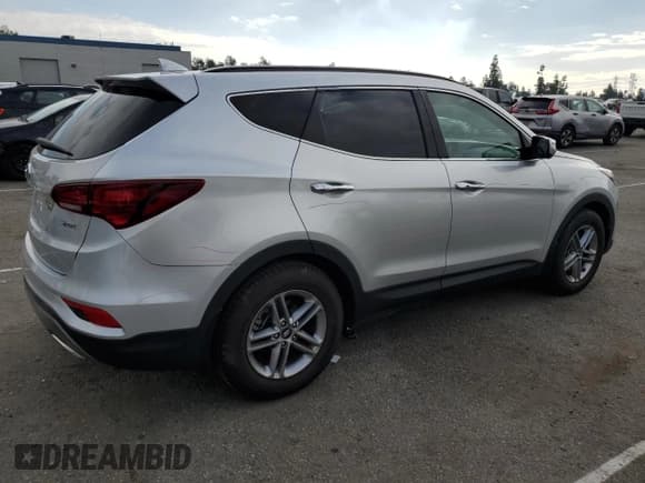 ✅ 2018 Hyundai Santa Fe 2.4L • VIN: 5XYZU3LB7JG517849 • Lot: 93773105. Listed on Copart with 16,936 mi. Free auction sales archive from the USA and detailed vehicle history report at DreamBid. Image 3.