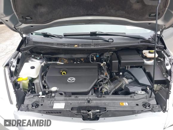 ✅ 2014 Mazda 5 Touring • VIN: JM1CW2CL7E0175902 • Lot: 43287647. Listed on IAAI with 98,037 mi. Free auction sales archive from the USA and detailed vehicle history report at DreamBid. Image 10.