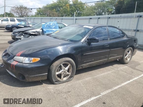 ✅ 2002 Pontiac Grand Prix GT • VIN: 1G2WP52K82F138021 • Lot: 64775974. Wystawiony na Copart z przebiegiem 208 762 mil. Bezpłatny archiwum sprzedaży aukcyjnych z USA i szczegółowy raport historii pojazdu na DreamBid. Zdjęcie 1.