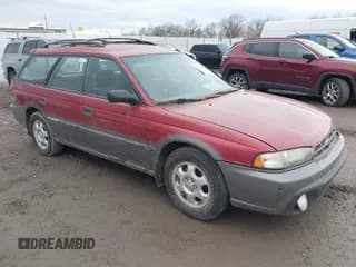 ✅ 1996 Subaru Legacy Outback • VIN: 4S3BG6853T7375366 • Lot: 43860810. Listed on IAAI with 265,696 mi. Free auction sales archive from the USA and detailed vehicle history report at DreamBid. Image 1.