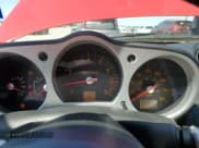 ✅ 2004 Nissan 350Z Enthusiast • VIN: JN1AZ36D34T102258 • Lot: 71030624. Wystawiony na Copart z przebiegiem 106 099 mil. Bezpłatny archiwum sprzedaży aukcyjnych z USA i szczegółowy raport historii pojazdu na DreamBid. Zdjęcie 9.